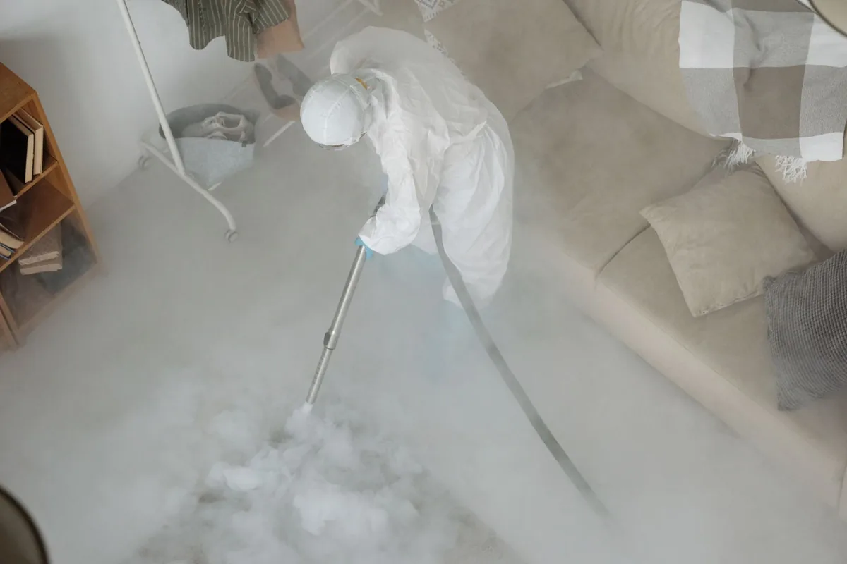 Biohazard cleanup technician in protective equipment, Pawtucket, RI